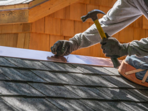 Emergency roofing service in action after a storm