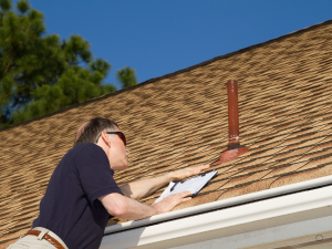 Roof inspection by certified roofer in Kingwood